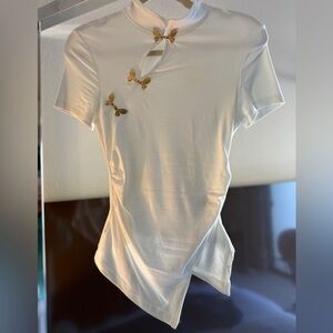 Mandarin collar white ruched split top with Gold Accents